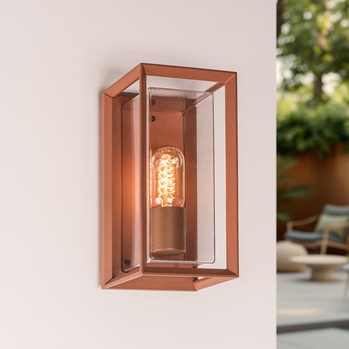 Galway industrial outdoor box wall lantern in rust brown finish mounted on exterior wall