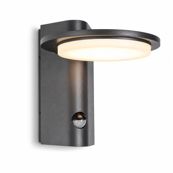 Mayson dark grey LED outdoor wall light with round warm white panel and PIR sensor, angled view