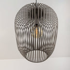 Riva light grey cage pendant light installed in modern kitchen interior