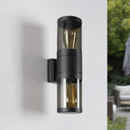 Rouen outdoor wall light in black finish illuminated at night