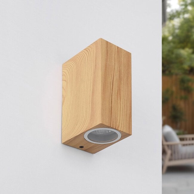 Talia aluminium and wood effect wall light installed in modern hallway interior