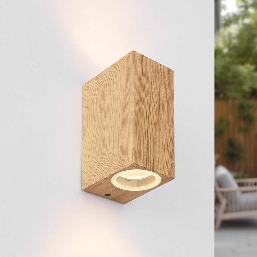 Talia up down wall light in aluminium with wood effect finish on white background